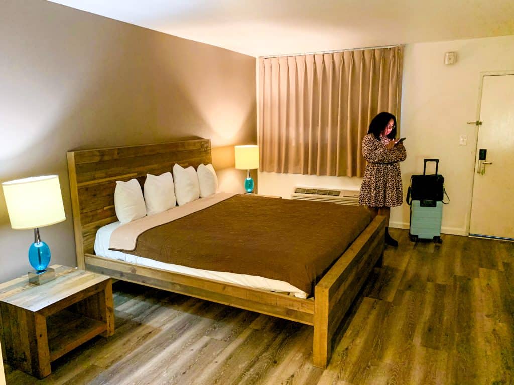 A woman is standing in a hotel room in Las Vegas.