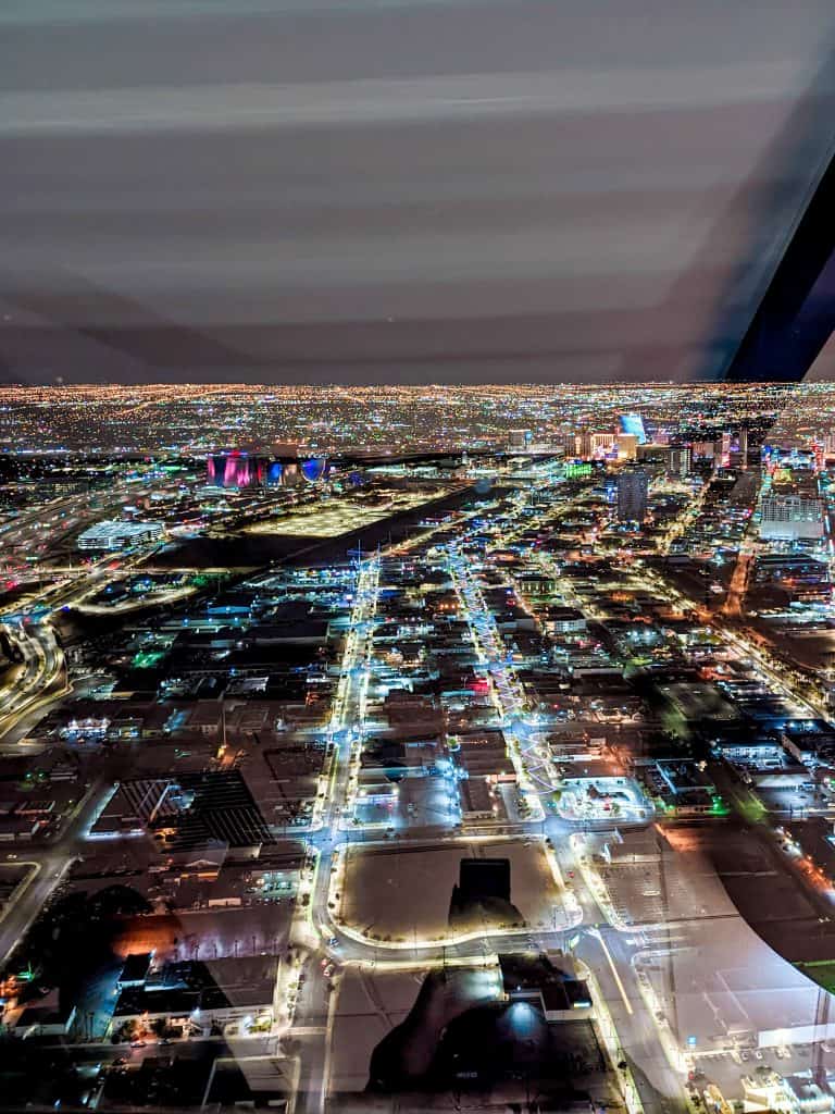 A city at night from a window in Las Vegas.