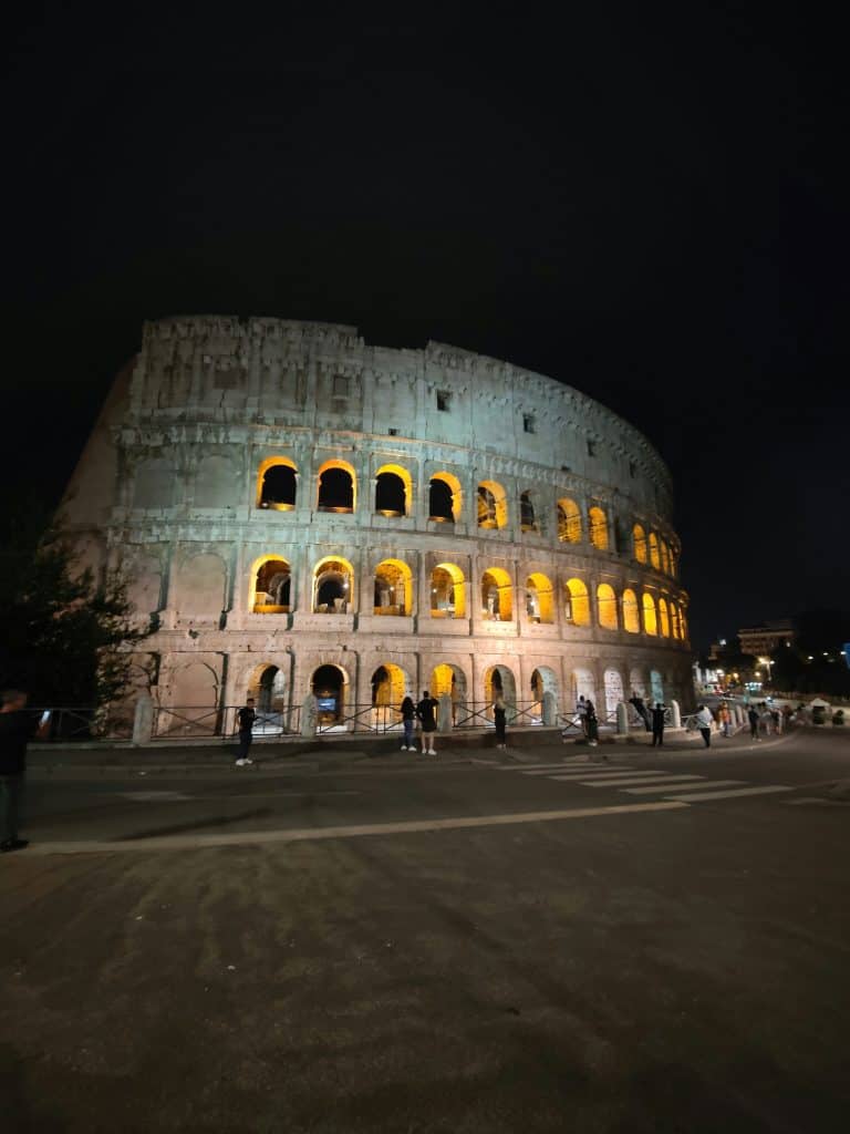 The colosseum in Rome illuminated at night is the best way to see this historic monument.